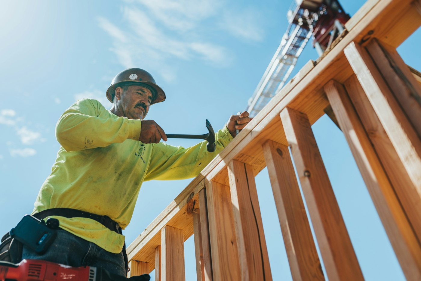 Builder working on a deck - income protection