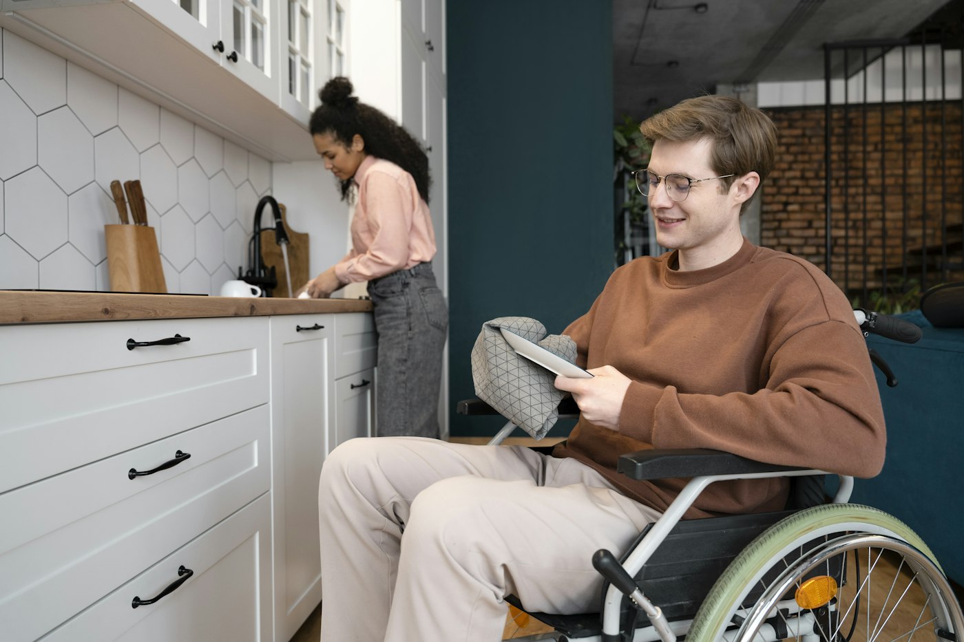 Man in a wheelchair at home - TPD insurance